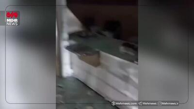 لحظه به آتش کشیده شدن یک بانک توسط اغتشاشگران