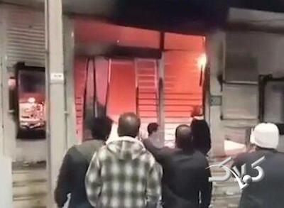 لحظه به آتش کشیده شدن یک بانک توسط اغتشاشگران - مجله اینترنتی کولاک