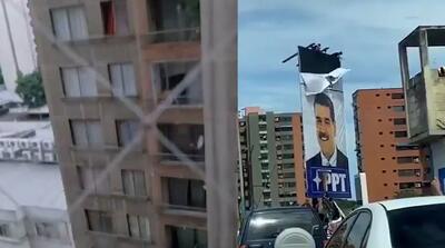 پایین کشیدن تصاویر مادورو در ونزوئلا توسط مخالفین