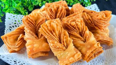  طرز تهیه شیرینی هزار پر با تخم مرغ و شکر و آب