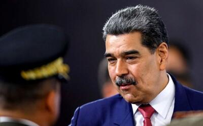 مادورو با دست بسته در محاصره ماموران آمریکایی+ فیلم