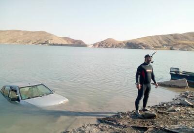 ببینید / سقوط خودرو به داخل سد مهاباد و جان باختن راننده