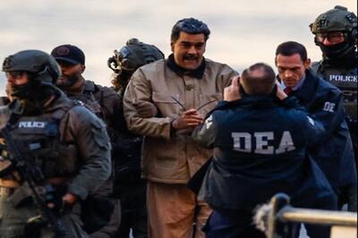 تصاویری از انتقال مادورو و همسرش  به دادگاه