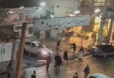 قهرمان کشتی جهان: گرانی چه ربطی به آتش‌زدن حسینیه دارد؟