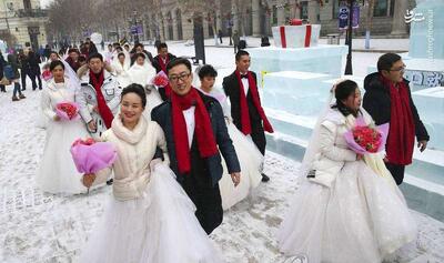 زوج‌های چینی در سرمای یخبندان پیمان ازدواج بستند