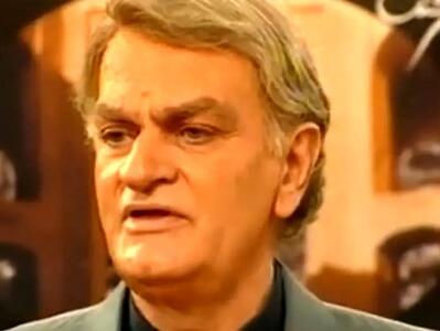  فتحعلی اویسی در 40سالگی و در کنار پسرش؛ سال 64