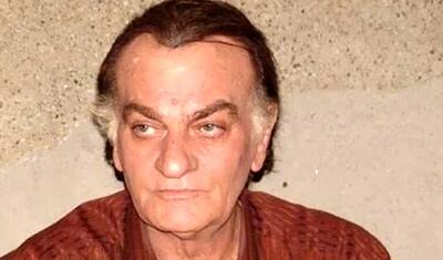 فتحعلی اویسی در ۴۰سالگی و در کنار پسرش؛ سال ۶۴