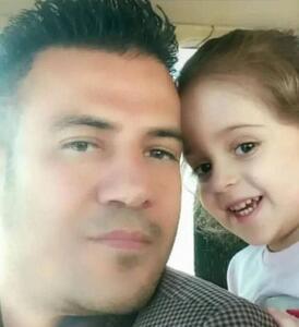 عکس: تصویری سوزناک از شهید حقیقت به همراه فرزندش