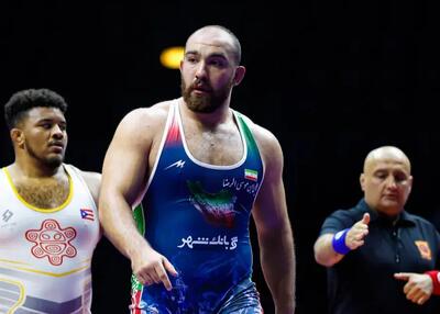  کری غول کشتی ایران برای قهرمان المپیک: برگرد!