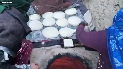  پخت نان سنتی در غار روستایی افغانستان در هوای برفی