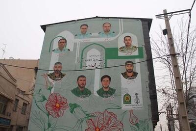  تمثال شهدای نیروی انتظامی بر دیوار مجاور بلوار بلال