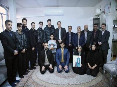 تجلیل فدراسیون تکواندو از خانواده شهید خدابنده‌لو