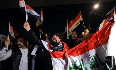  خشم عراقی ها از رئیس جمهور آمریکا/ عکس ترامپ به آتش کشیده شد+ تصاویر