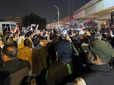 تظاهرات حامیان نوری المالکی در حمایت از نامزدی او برای تشکیل دولت جدید عراق