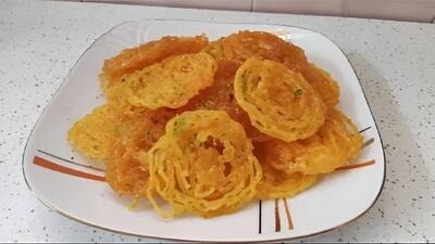  طرز تهیه زولبیا خانگی خوشمزه و ترد (رازهای درست کردن زولبیا کرییسپی)