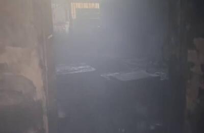 فیلم/ وقوع آتش‌سوزی در یک کارگاه کفاشی در تهران