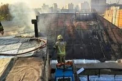 آتش سوزی در خیابان خیام تهران