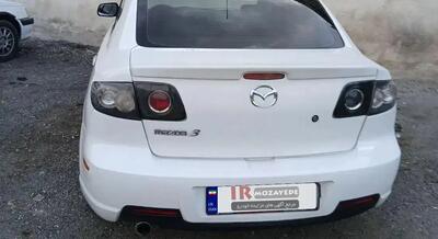  حراج 750/000/000 تومانی مزدا 3 سفید (توقیفی)