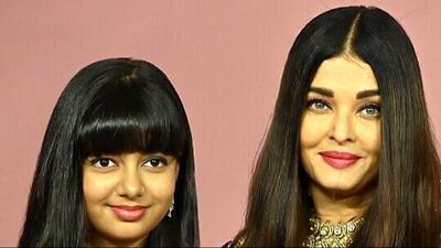  جشن تولد ساده و خودمونی دختر آیشواریا، چهره محبوب هند/تزئین زیبای کیک شکلاتی با فندق و خلال بادوم