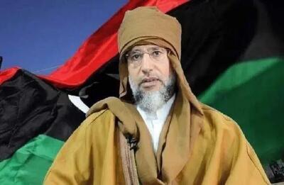  تصاویری توجه‌برانگیز از جمعیت حاضر در تشییع پسر قذافی، دیکتاتور لیبی