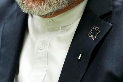  نقشه ایران روی کت عراقچی