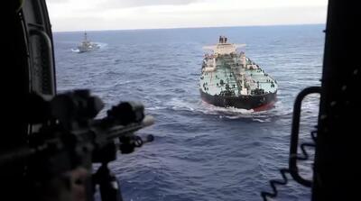  تصاویر حمله کماندوهای آمریکا برای توقیف یک نفتکش