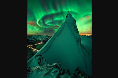  عکس روز ناسا از نمایش سبزرنگ شفق قطبی