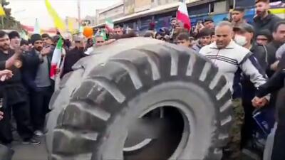  برگزاری مسابقه مردان آهنین در راهپیمایی 22 بهمن