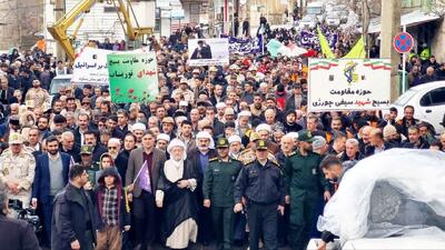  نقاشی ترامپ و ماکت موشک ایرانی برای اسرائیل در تصاویر راهپیمایی 22 بهمن + عکس