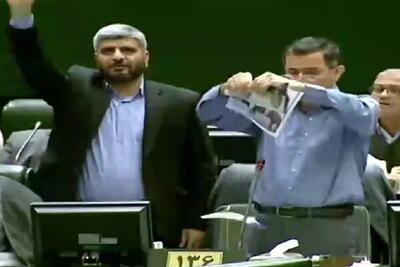  نماینده تهران تصاویر سران اروپایی را به سطل آشغال ریخت