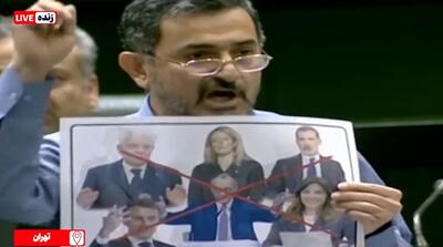  پاره کردن تصاویر سران اروپا در مجلس را ببینید