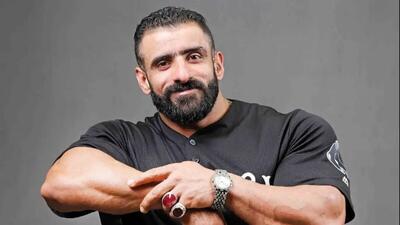  تغییر چهره گرگ پارسی با سِبیل های مشتی ؛ قهرمان بدن سازی با سبیل دسته دارش قابل شناسایی نیست +عکس