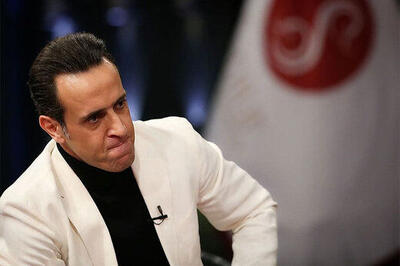  علی کریمی تهدید به سوزاندن قرآن کرد