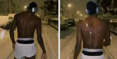  راه رفتن نیکولاس جکسون با شورت در خیابان برفی آلمان