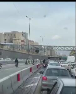  موبایل‌قاپی در ترافیک اتوبان امام علی؛ فیلم جنجالی