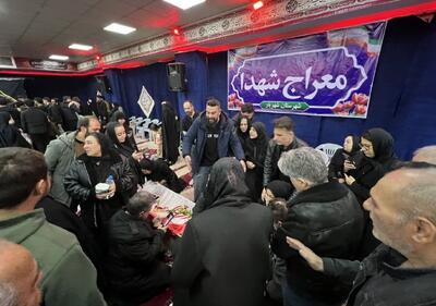  وداع خانواده‌ها با پیکر 3 شهید راه قدس معراج شهدای شهریار تصویر - تسنیم