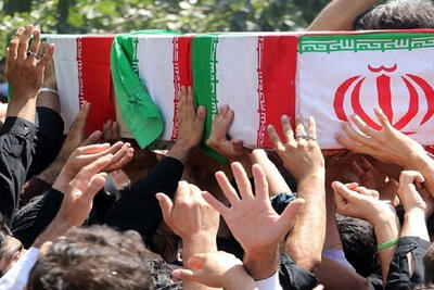  تشییع پیکر شهیدان هانیه و فائزه جهانشاهلو در بوئین زهرا