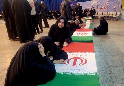  خاکسپاری حدود 40 شهید حمله آمریکایی صهیونی در قطعه 42 - تسنیم