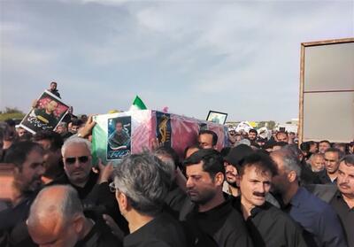 تشییع پیکر  شهید اقتدار رمضان در روستای هلیله بوشهر - تسنیم