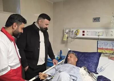  عیادت امیرعلی اکبری از مجروحان جنگ تجاوزکارانه