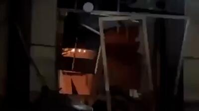  تصاویر حمله آمریکا به بانک سپه