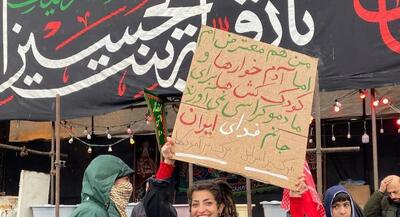  شمایل متفاوت این زن در راهپیمایی خبرساز شد