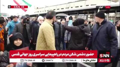  حجت الاسلام اژه‌ای همراه مردم حین حمله دشمن