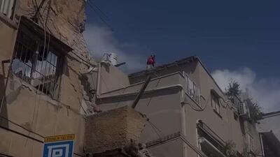  تصاویری از پیامدهای حمله موشکی تلافی‌جویانه ایران به تل‌آویو