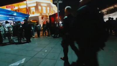  بانوی گیلانی با پرچمی بر شانه و کیسه در دست به میدان آمد تا ثابت کند حماسه در یک حرکت ساده خدمت خلاصه می‌شود + فیلم