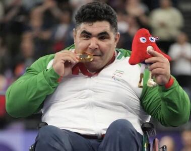  قهرمان پاراوزنه‌برداری: تا پای جان ایستاده‌ام تا دشمن را پشیمان کنم
