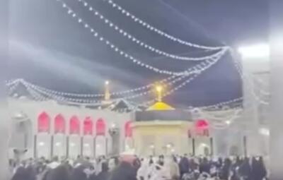  شعار الله اکبر زائران حرم مطهر امام رضا (ع) همزمان با فعال شدن پدافند هوایی برای مقابله با اهداف متخاصم