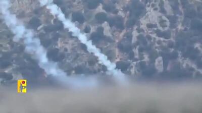  حضور یک رزمنده حزب الله با کفن پای لانچر + فیلم