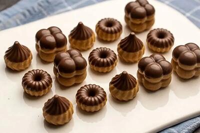  طرز تهیه برشتوک نخودچی؛ شیرینی سنتی مخصوص نوروز