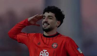  واکنش معنادار ستاره تیم ملی  با تصویری از دستان رهبر شهید انقلاب با اشاره به کلام حضرت موسی (ع)